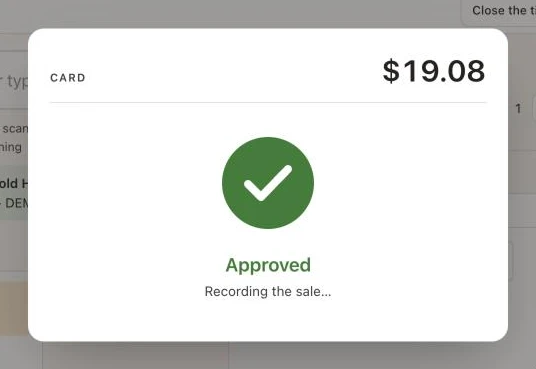 The card payment window with the green Approved circle